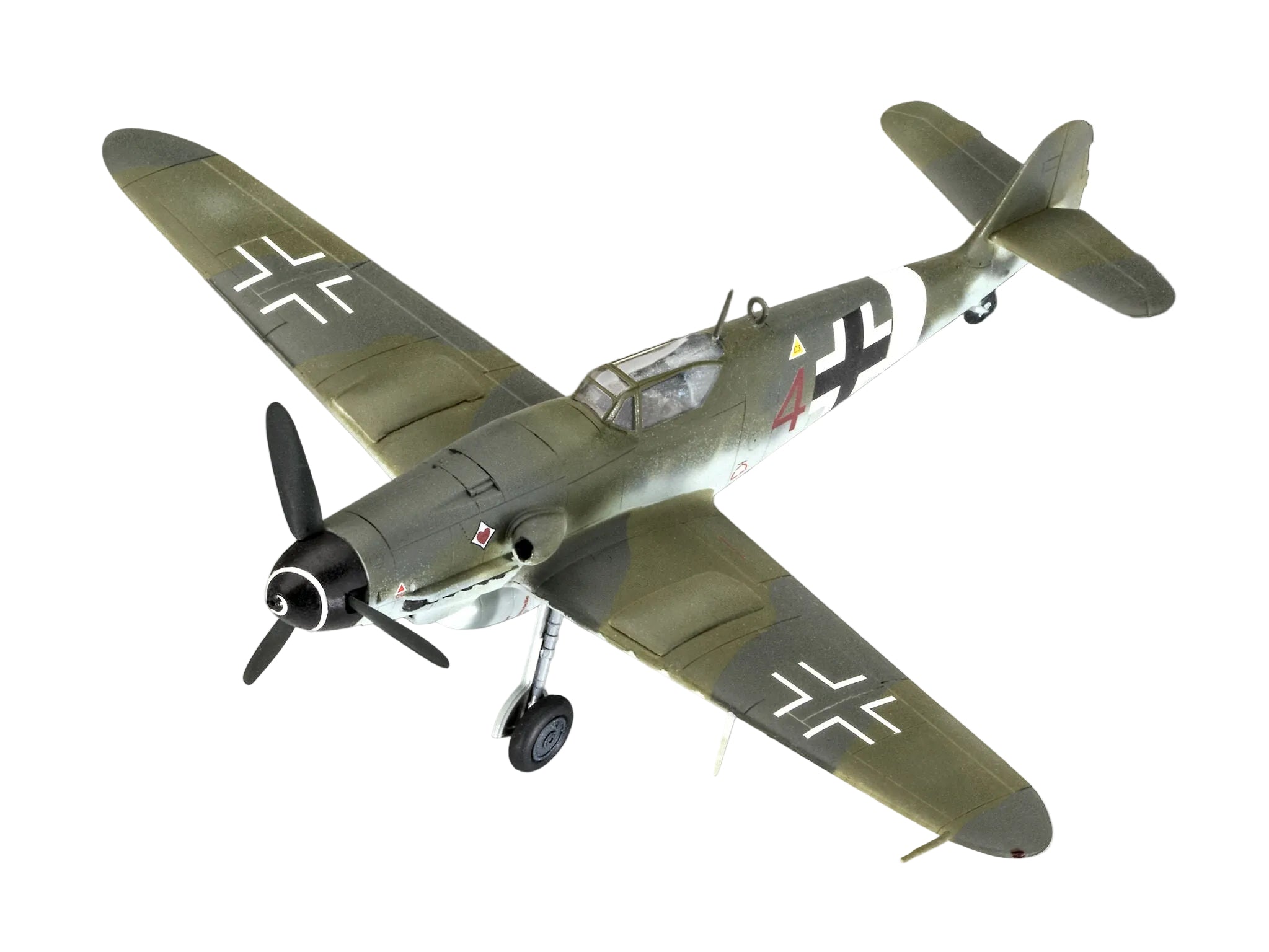 Model of a World War II-era fighter plane with camouflage paint job on a gradient background