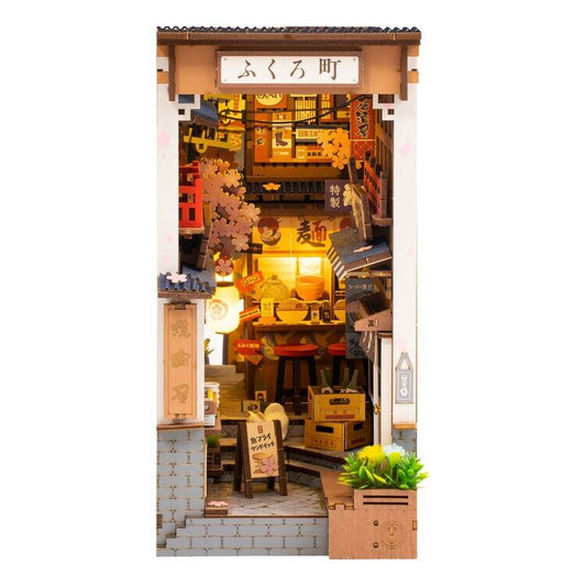 Miniature model of a Japanese restaurant with detailed interior and exterior.